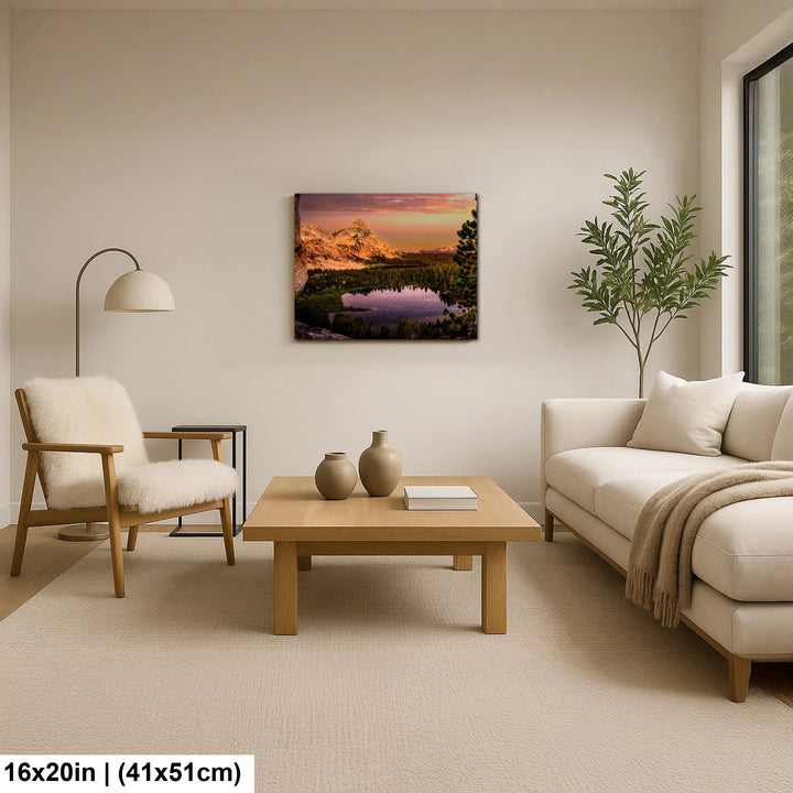 Cozy living room with minimalist furniture and a mountain landscape print above the sofa, featuring a peaceful lake surrounded by trees and soft sunset lighting.